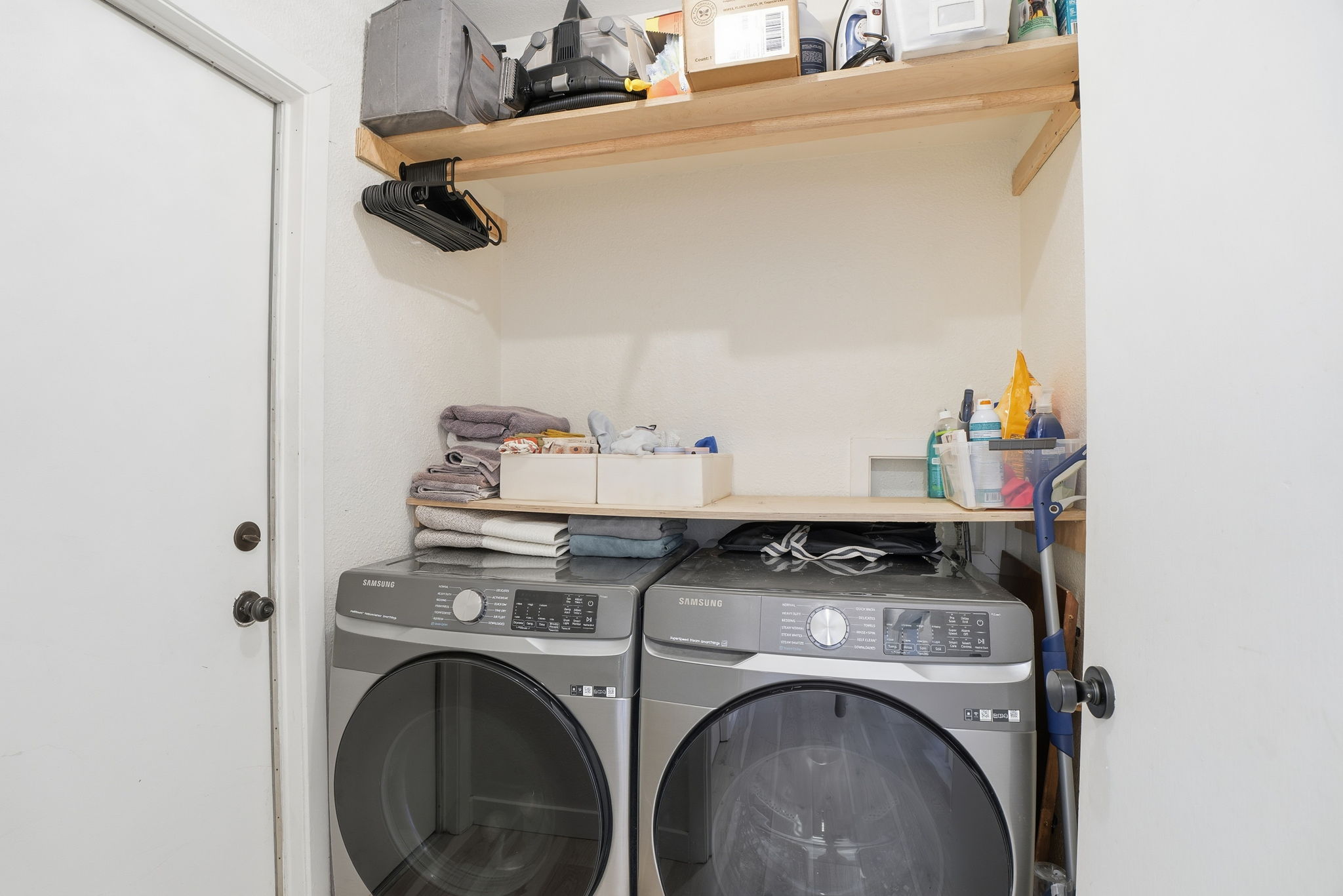 10305 Golden Quail Drive Austin, TX 78758 - Photo 33 of 39 a utility room with dryer and washer