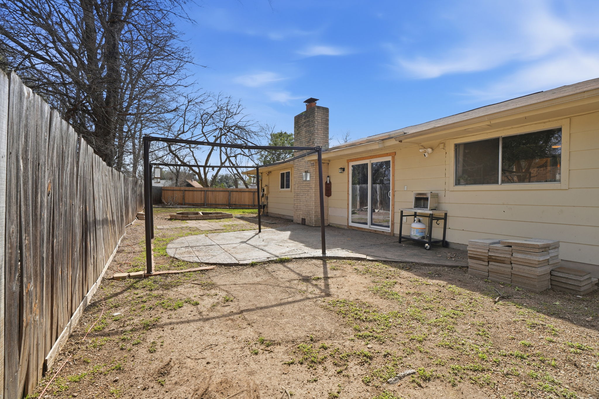 10305 Golden Quail Drive Austin, TX 78758 - Photo 36 of 39 a view of a house with wooden fence