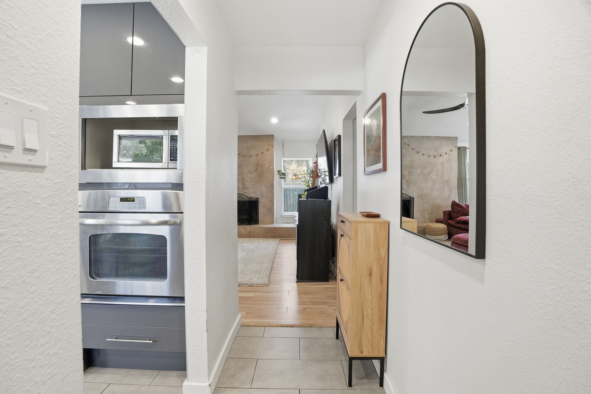 10305 Golden Quail Drive Austin, TX 78758 - Photo 10 of 39 a view of a kitchen from the hallway