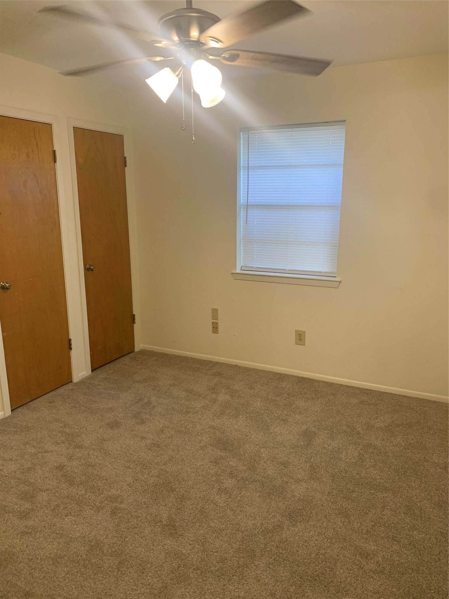 713-715 Cincinnati Street Angleton, TX 77515 - Photo 3 of 6 a view of an empty room with a window