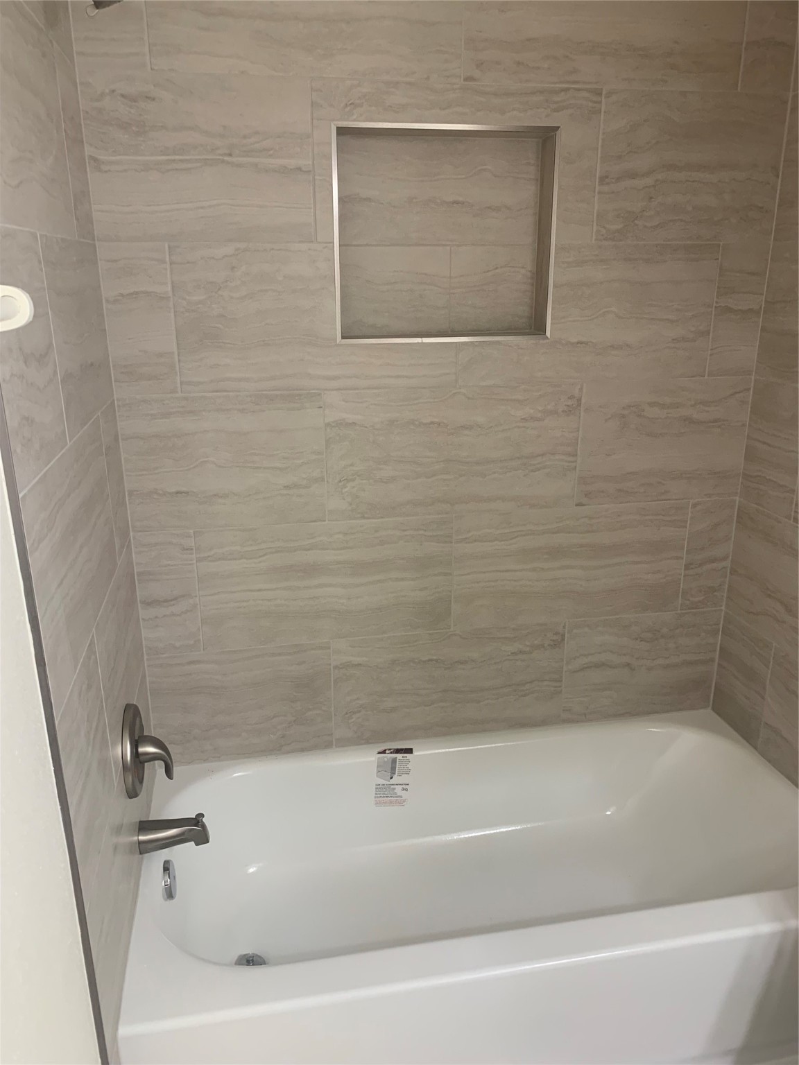 713-715 Cincinnati Street Angleton, TX 77515 - Photo 4 of 6 a bathroom with a bathtub