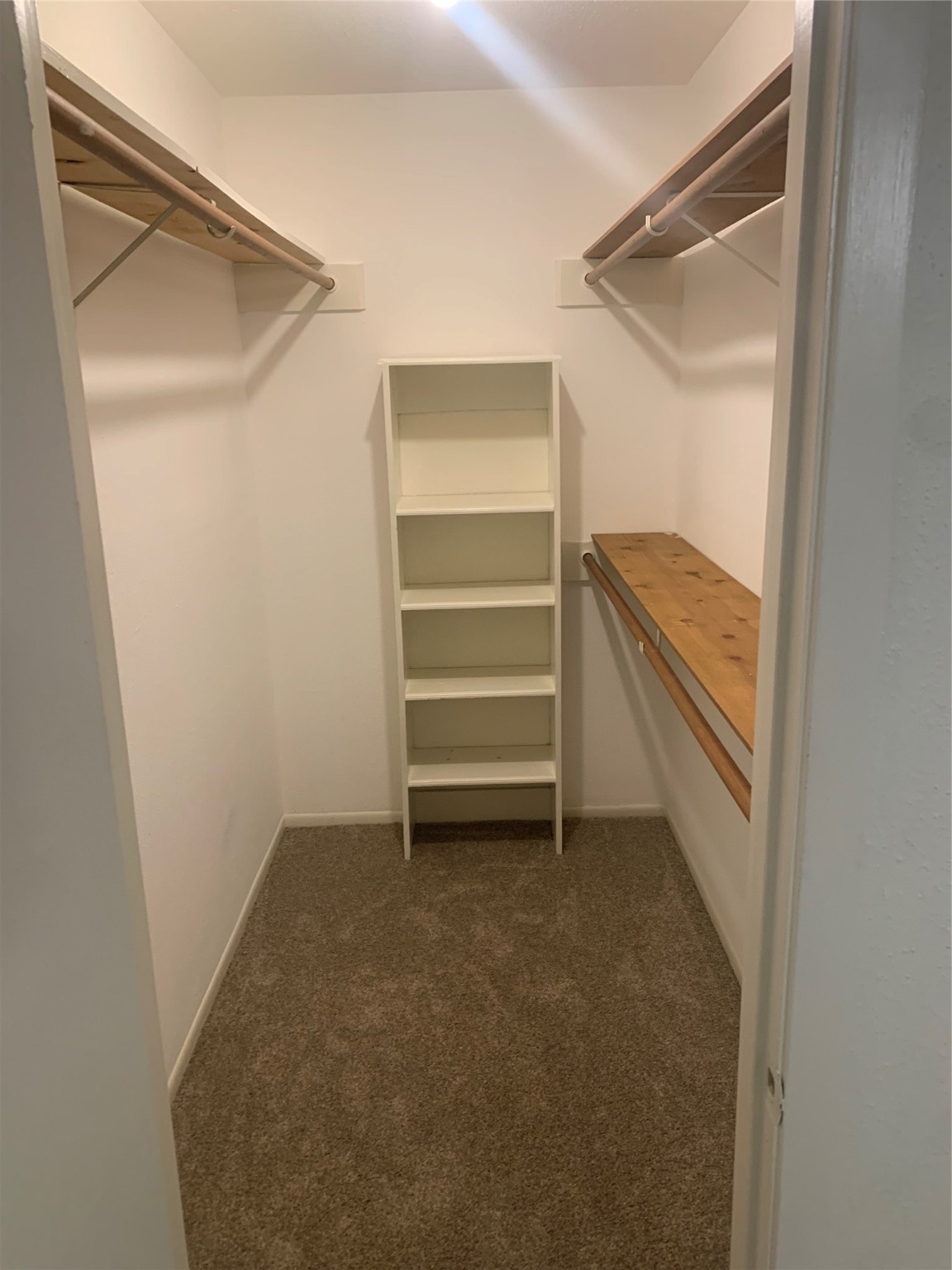 713-715 Cincinnati Street Angleton, TX 77515 - Photo 5 of 6 a view of an empty walk in closet