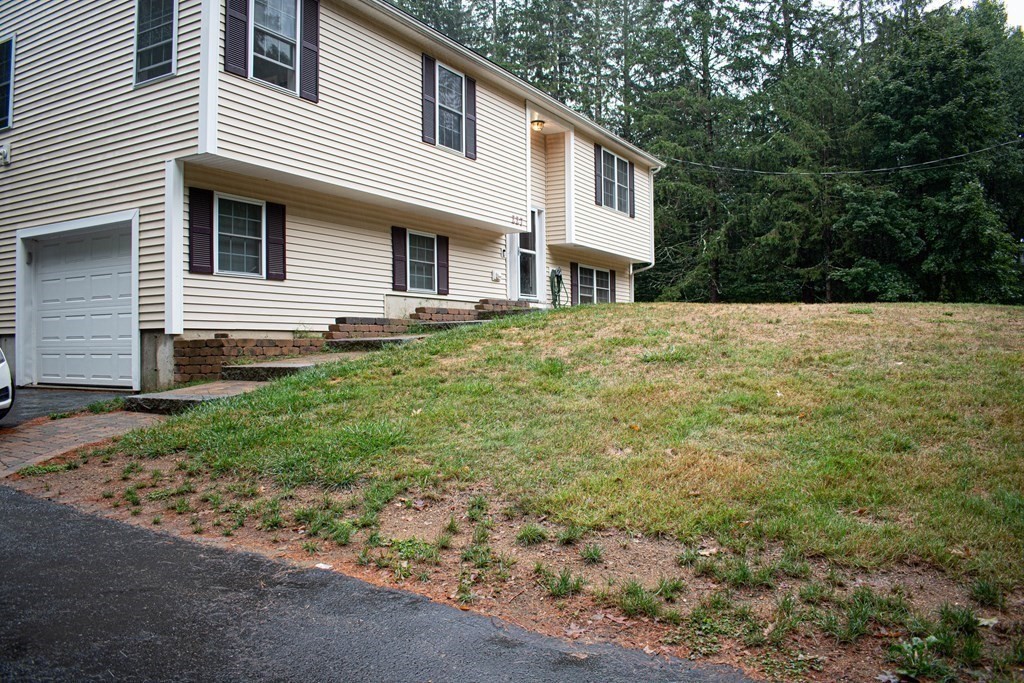 227 Turkey Hill Road Rutland, MA 01543 - Photo 2 of 30 a view of a house with a yard