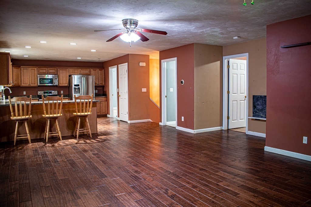 227 Turkey Hill Road Rutland, MA 01543 - Photo 5 of 30 a view of a dining room with furniture wooden floor and chandelier