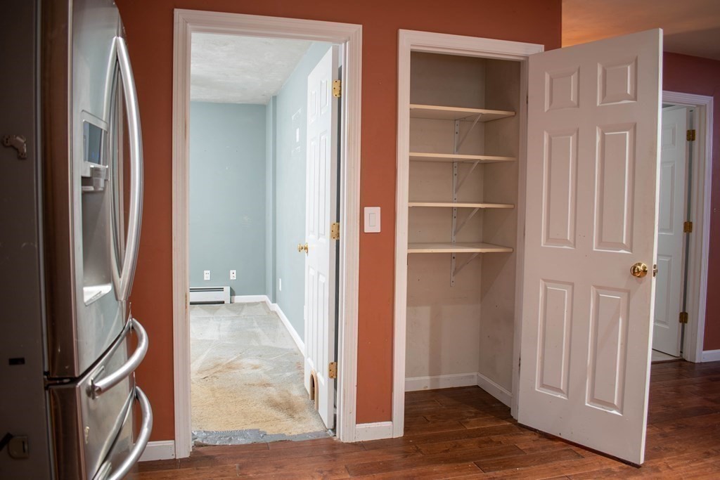 227 Turkey Hill Road Rutland, MA 01543 - Photo 6 of 30 a view of a kitchen from the hallway