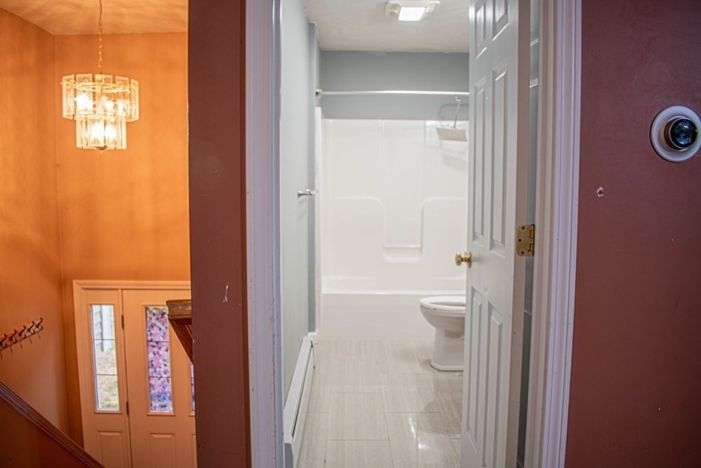 227 Turkey Hill Road Rutland, MA 01543 - Photo 9 of 30 a bathroom with a glass door shower and a sink