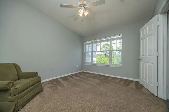 a view of a hallway with washer and dryer