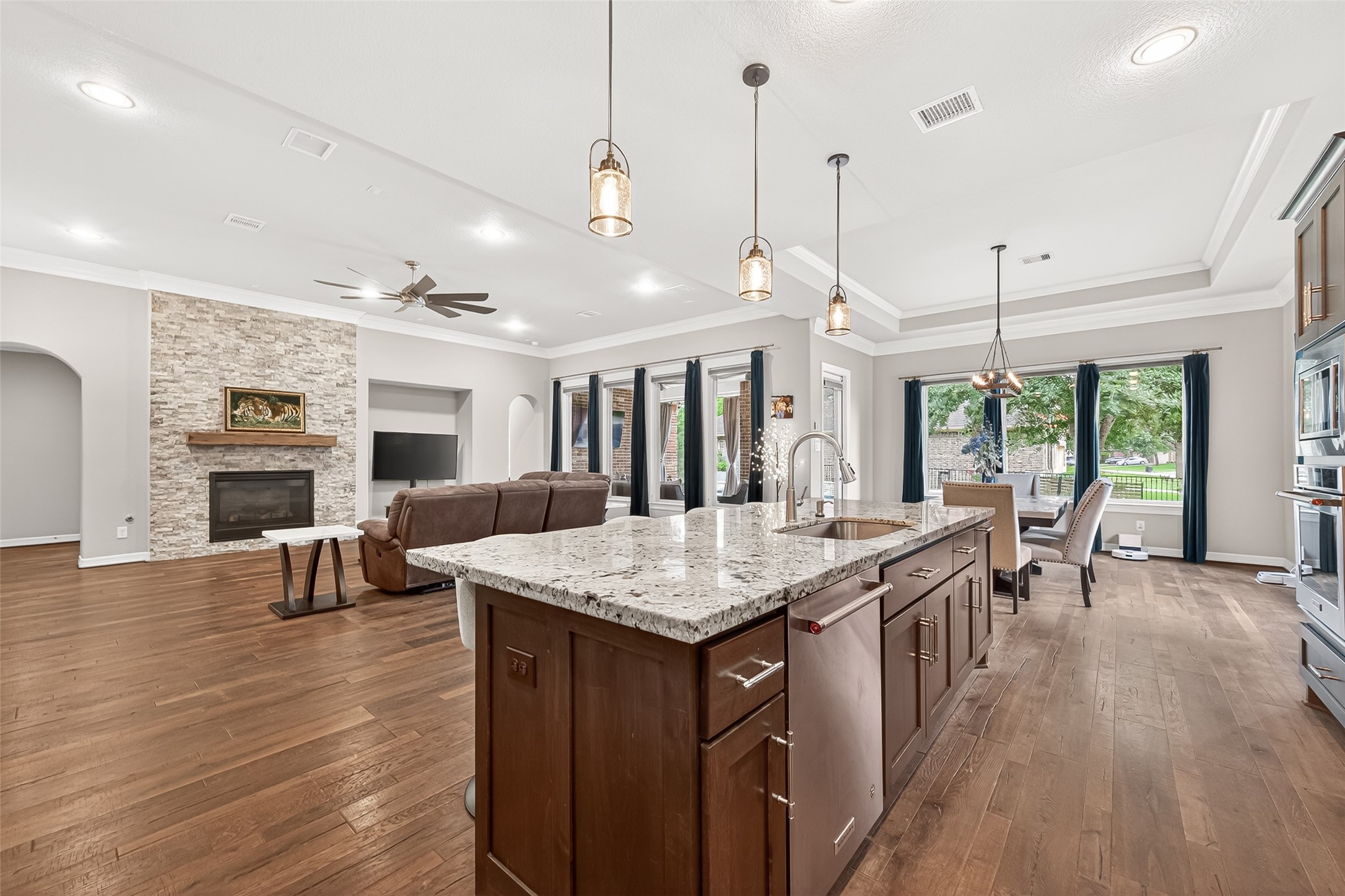 32607 Wingfoot Circle Fulshear, TX 77441 - Photo 22 of 39 An entertainer's delight, kitchen opens to the living room and eat-in space.
