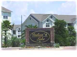 4009 Dancing Cloud Court, Unit 28 Destin, FL 32541 - Photo 1 of 1 a sign on the side of a building