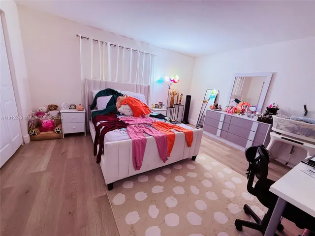 a bed room with a bed and a couch