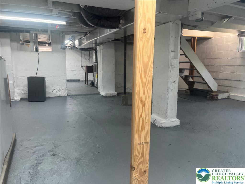 1839 Willow Park Road Bethlehem, PA 18020 - Photo 25 of 35 A utilitarian basement with concrete flooring and exposed structural elements, ready for storage or future development.