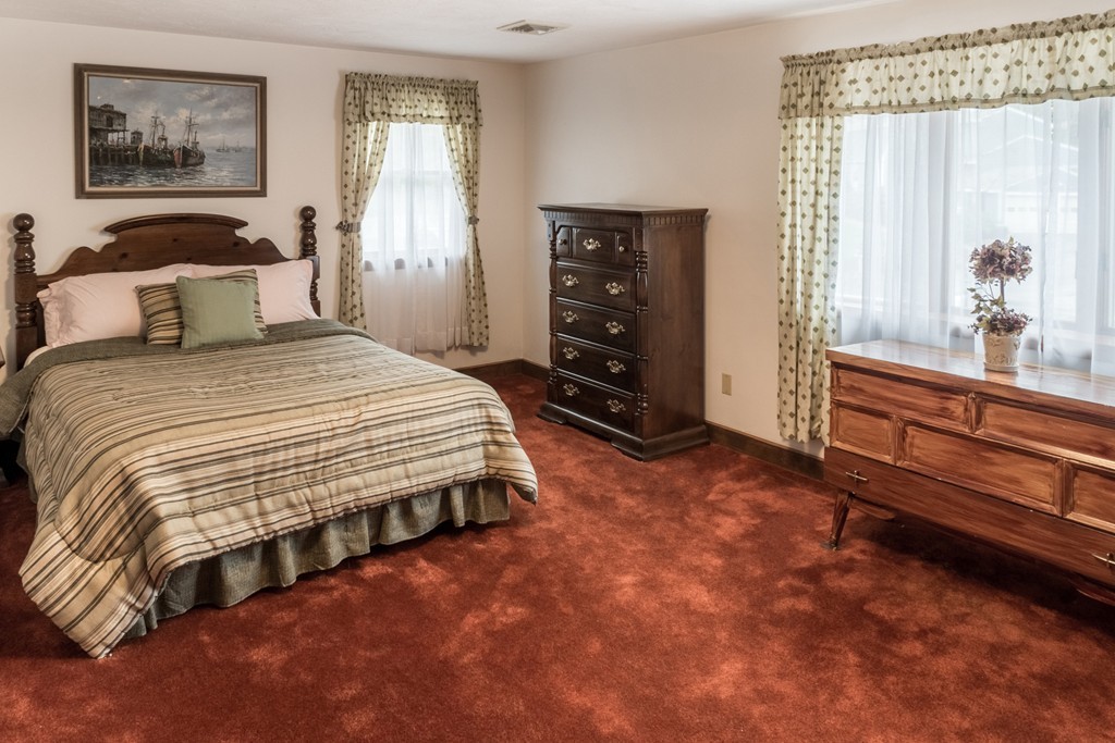 3 Surrey Lane Canton, MA 02021 - Photo 5 of 9 a bedroom with a bed and a dresser