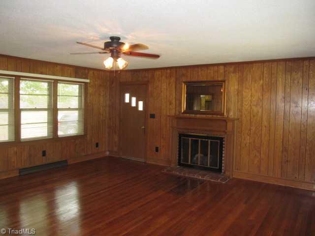 3624 Plum Tree Road Climax, NC 27233 - Photo 3 of 16 Living Room. Hardwood Floors, Gas Log Fireplace