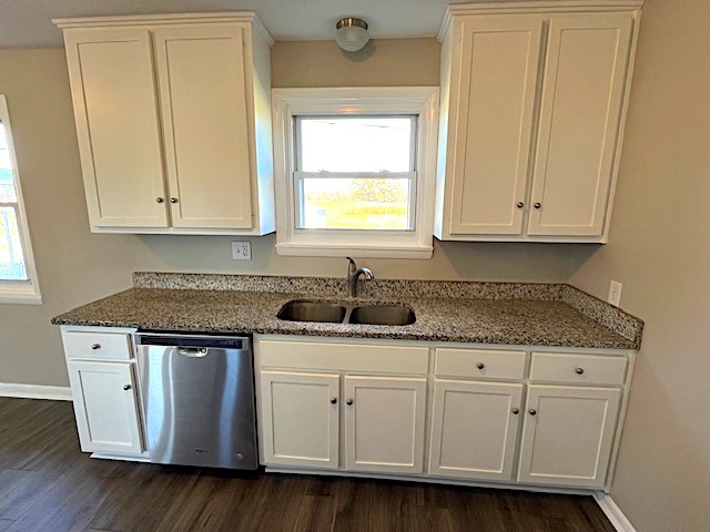 1291 Union Camp Road Lafayette, TN 37083 - Photo 11 of 28 a kitchen with granite countertop white cabinets and sink
