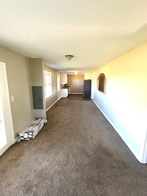 1291 Union Camp Road Lafayette, TN 37083 - Photo 13 of 28 a view of a livingroom with wooden floor and a ceiling fan