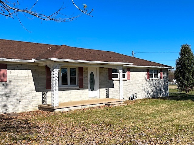 1291 Union Camp Road Lafayette, TN 37083 - Photo 2 of 28 a front view of a house with garden