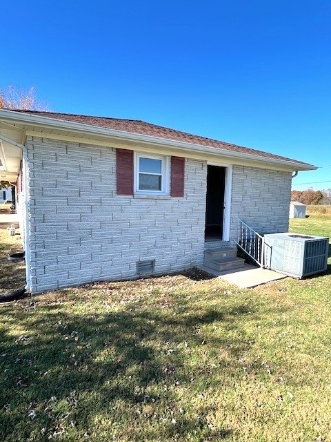 1291 Union Camp Road Lafayette, TN 37083 - Photo 4 of 28 a view of a house with a yard