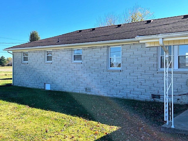 1291 Union Camp Road Lafayette, TN 37083 - Photo 8 of 28 a view of a brick house with a yard