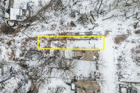 a view of swimming pool with a yard and seating space