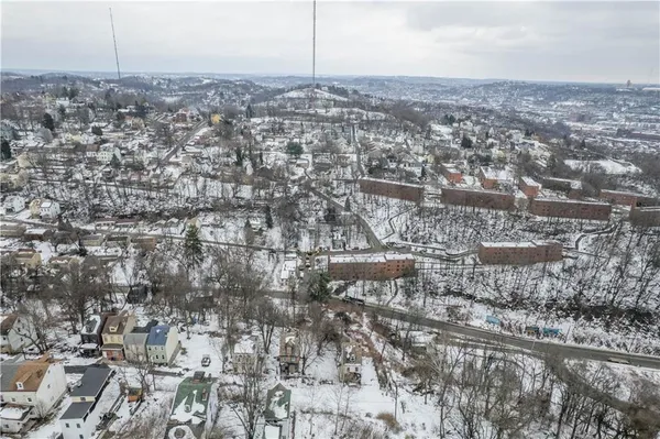 an aerial view of multiple house
