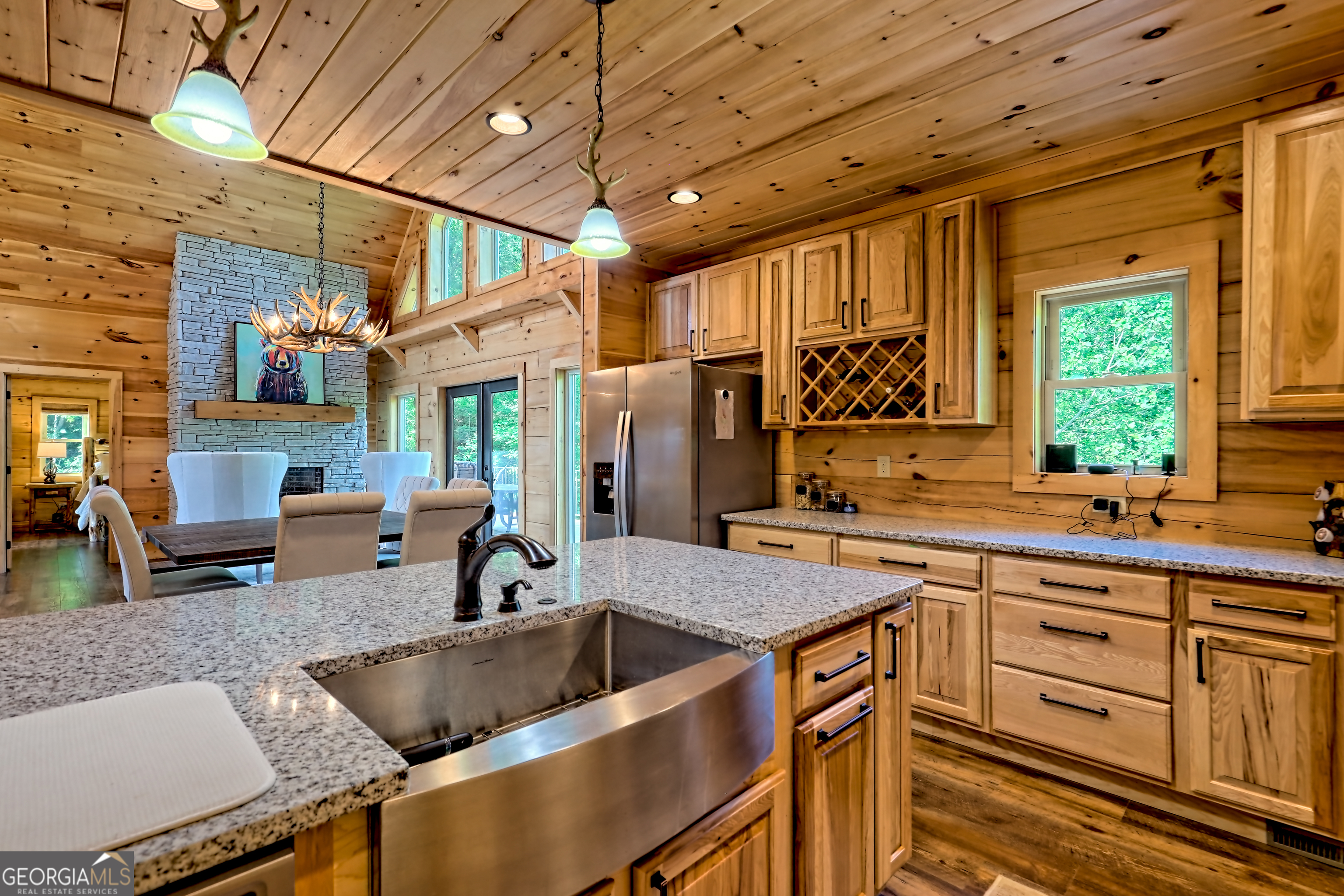 117 Ivy Rdg Way Clarkesville, GA 30523 - Photo 17 of 84 a kitchen with stainless steel appliances granite countertop a sink a stove and a refrigerator