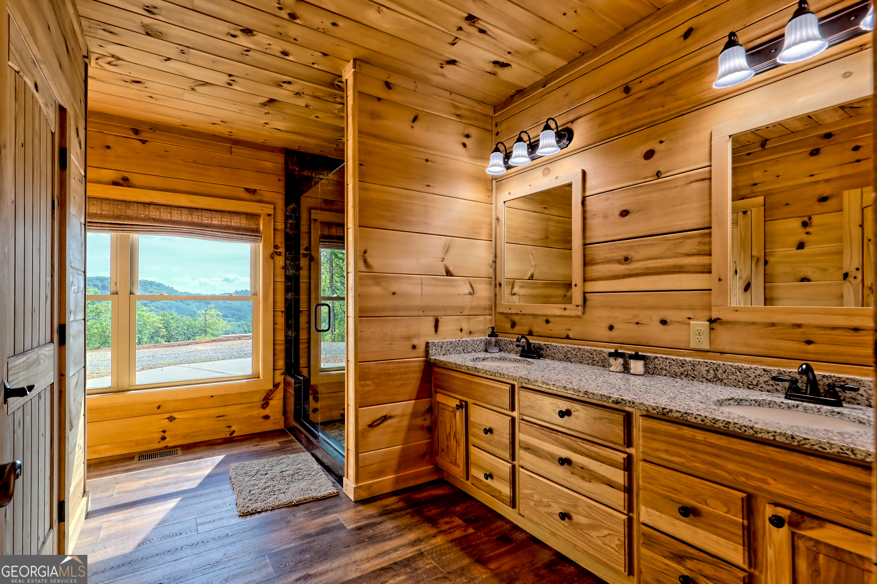 117 Ivy Rdg Way Clarkesville, GA 30523 - Photo 31 of 84 a bathroom with a granite countertop sink and a shower