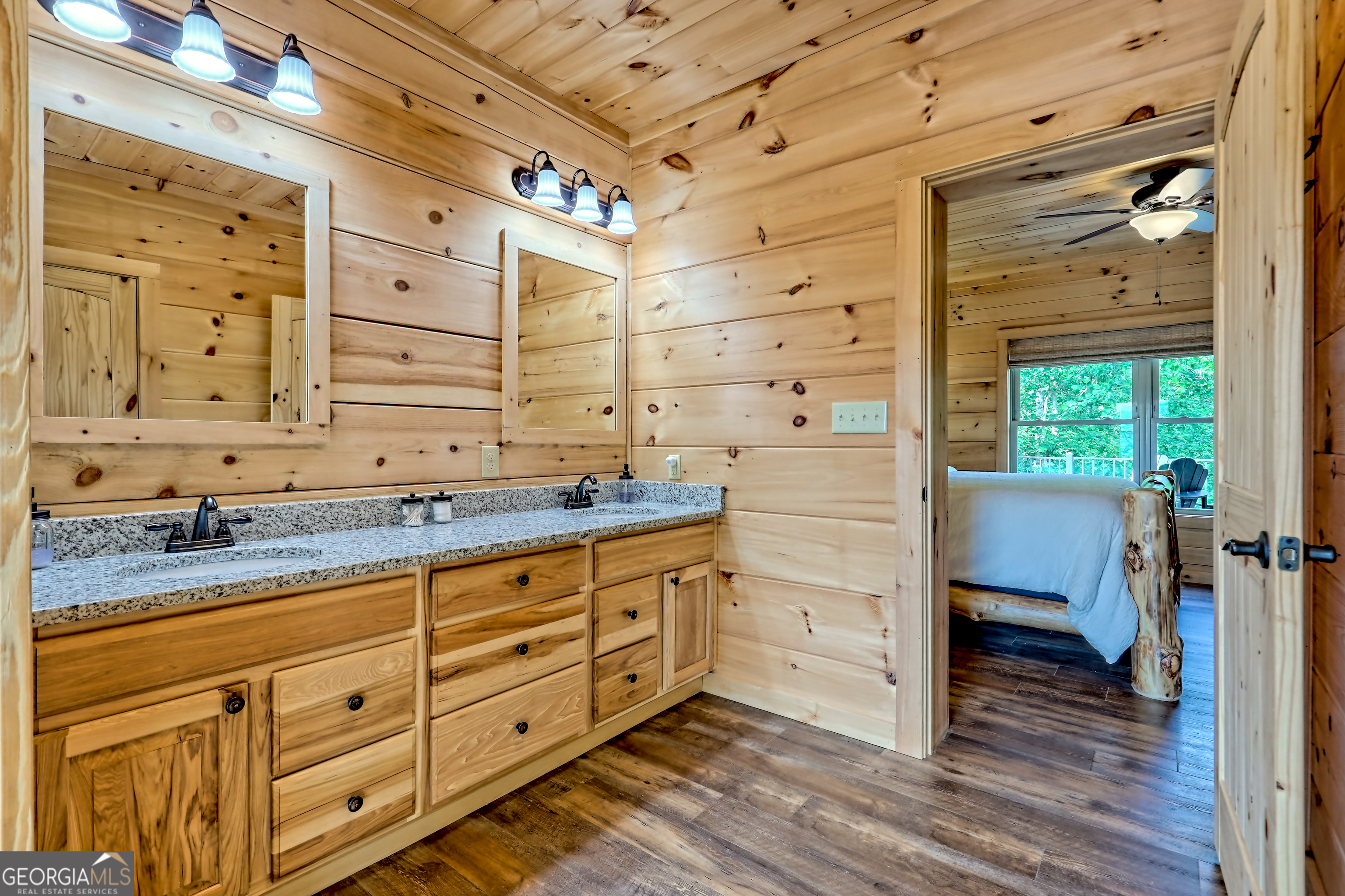 117 Ivy Rdg Way Clarkesville, GA 30523 - Photo 34 of 84 a bathroom with a granite countertop sink and a mirror