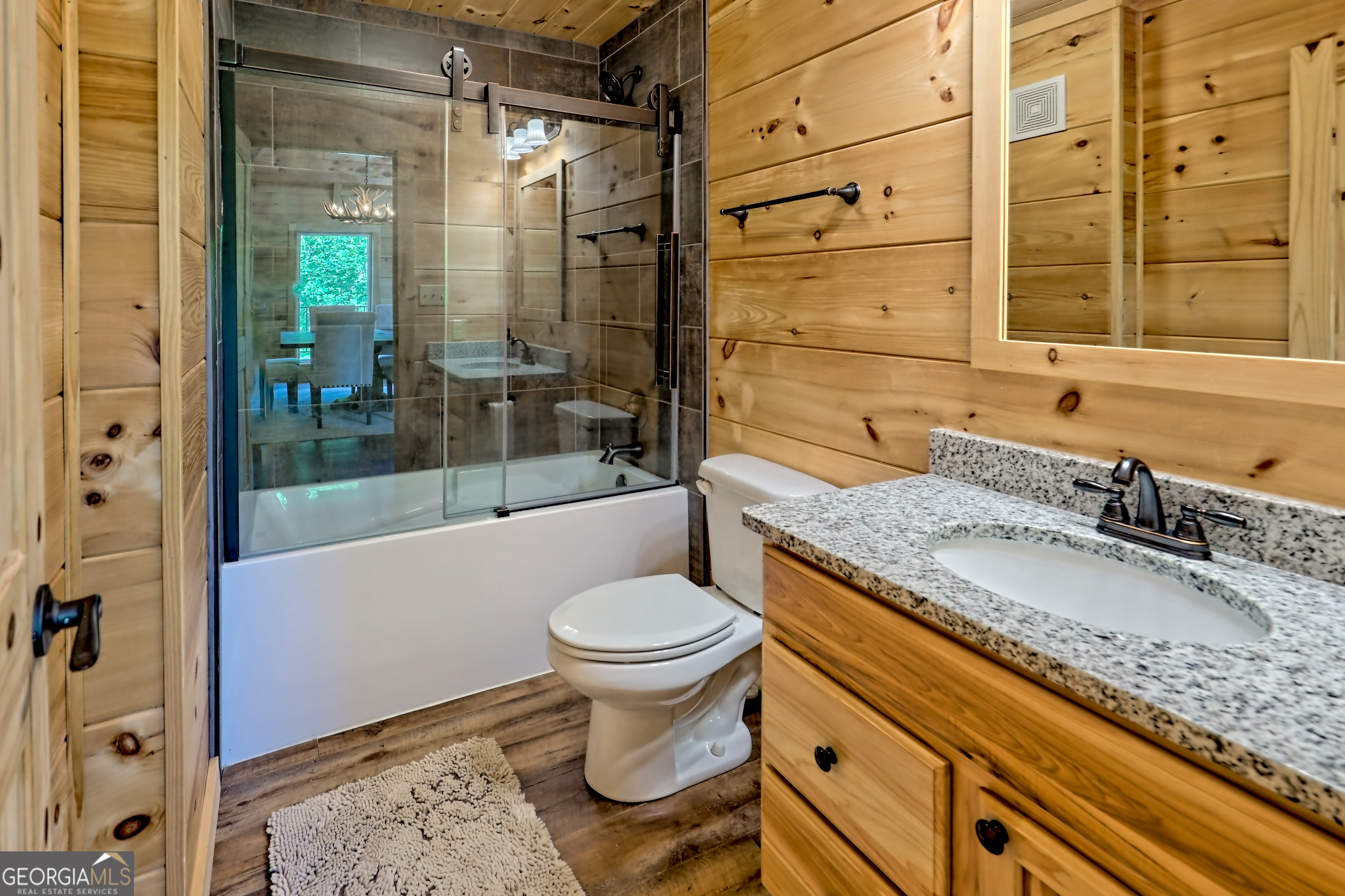 117 Ivy Rdg Way Clarkesville, GA 30523 - Photo 43 of 84 a bathroom with a granite countertop sink toilet and shower