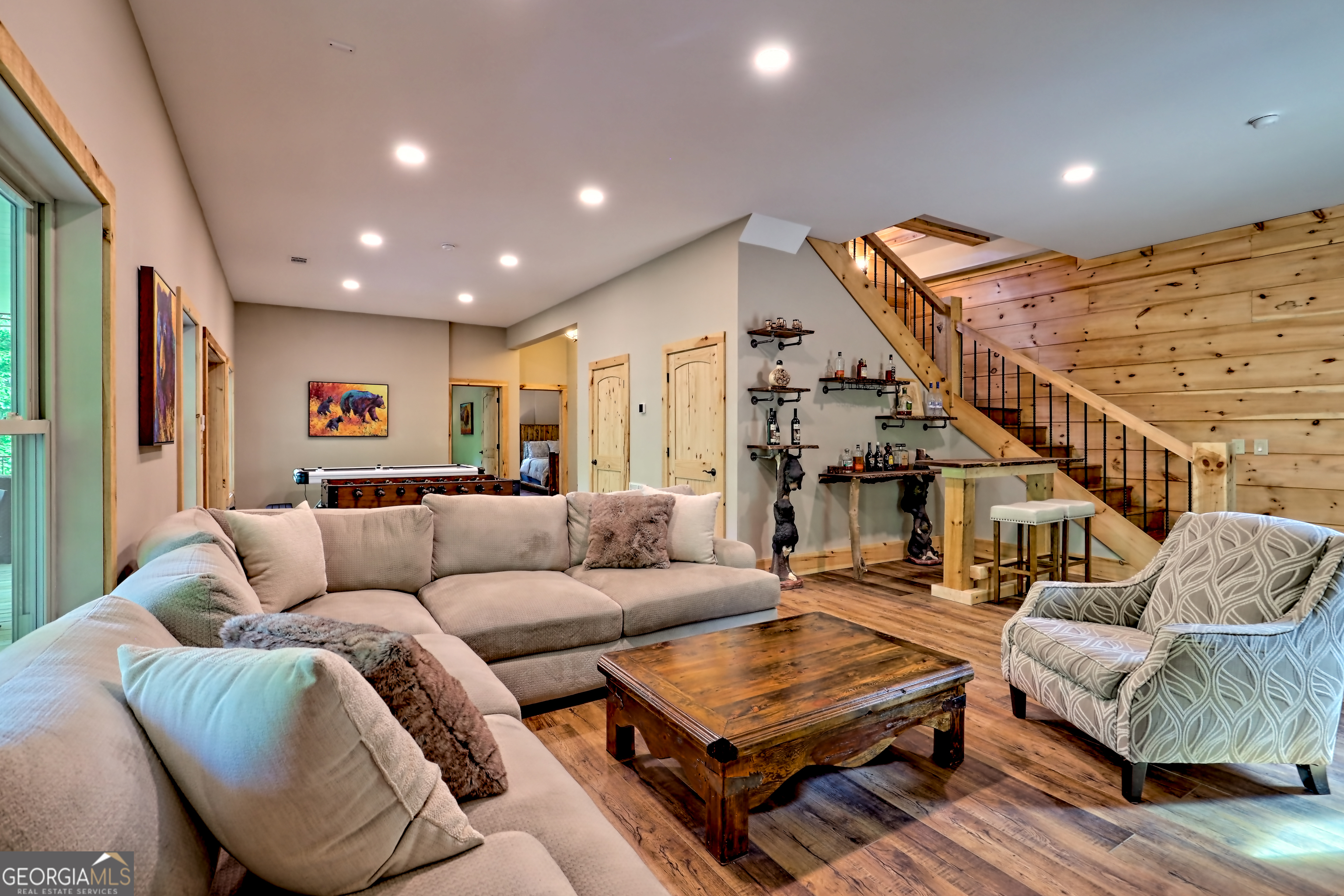 117 Ivy Rdg Way Clarkesville, GA 30523 - Photo 56 of 84 a living room with furniture and wooden floor