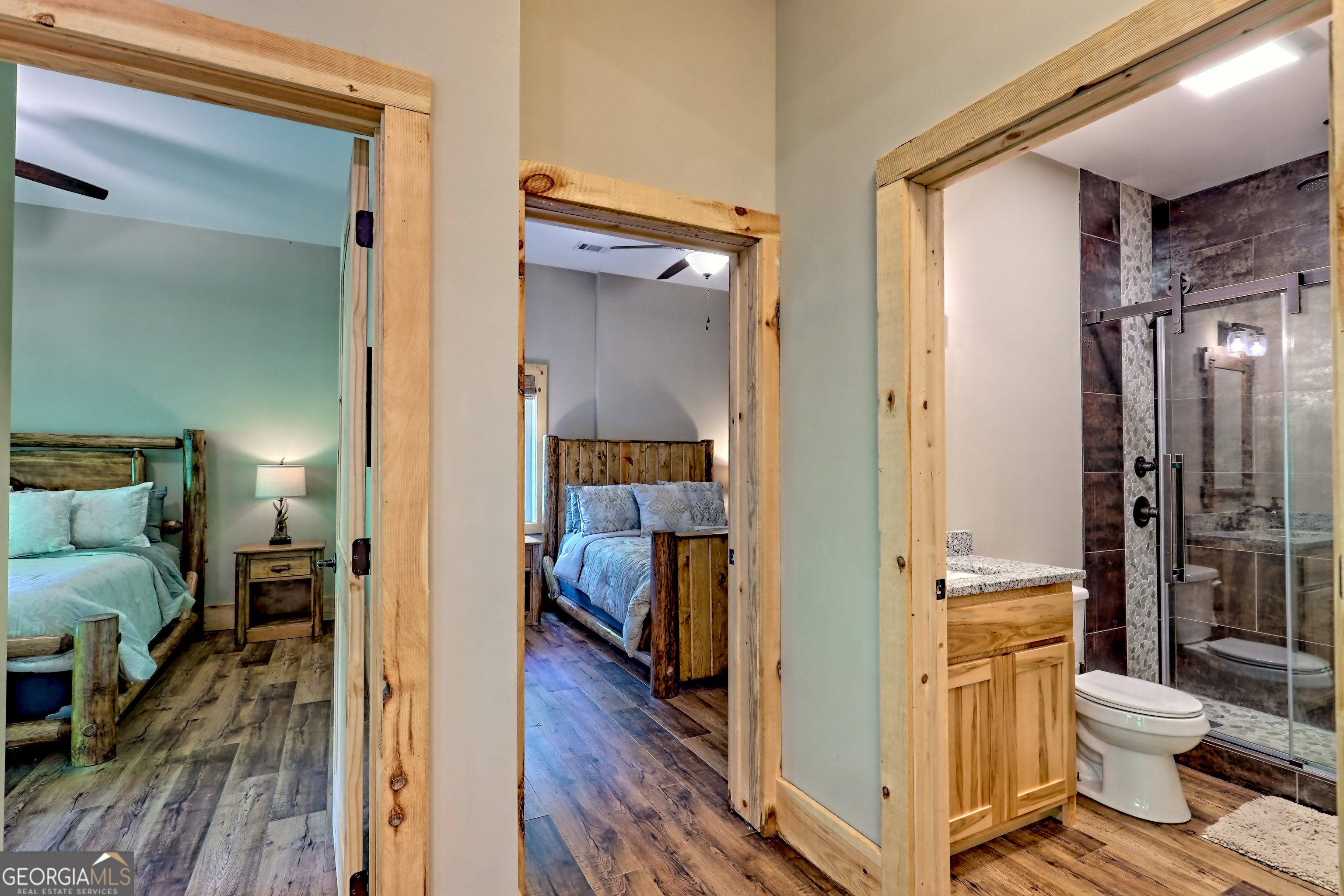 117 Ivy Rdg Way Clarkesville, GA 30523 - Photo 61 of 84 a bathroom with a toilet a sink and glass door