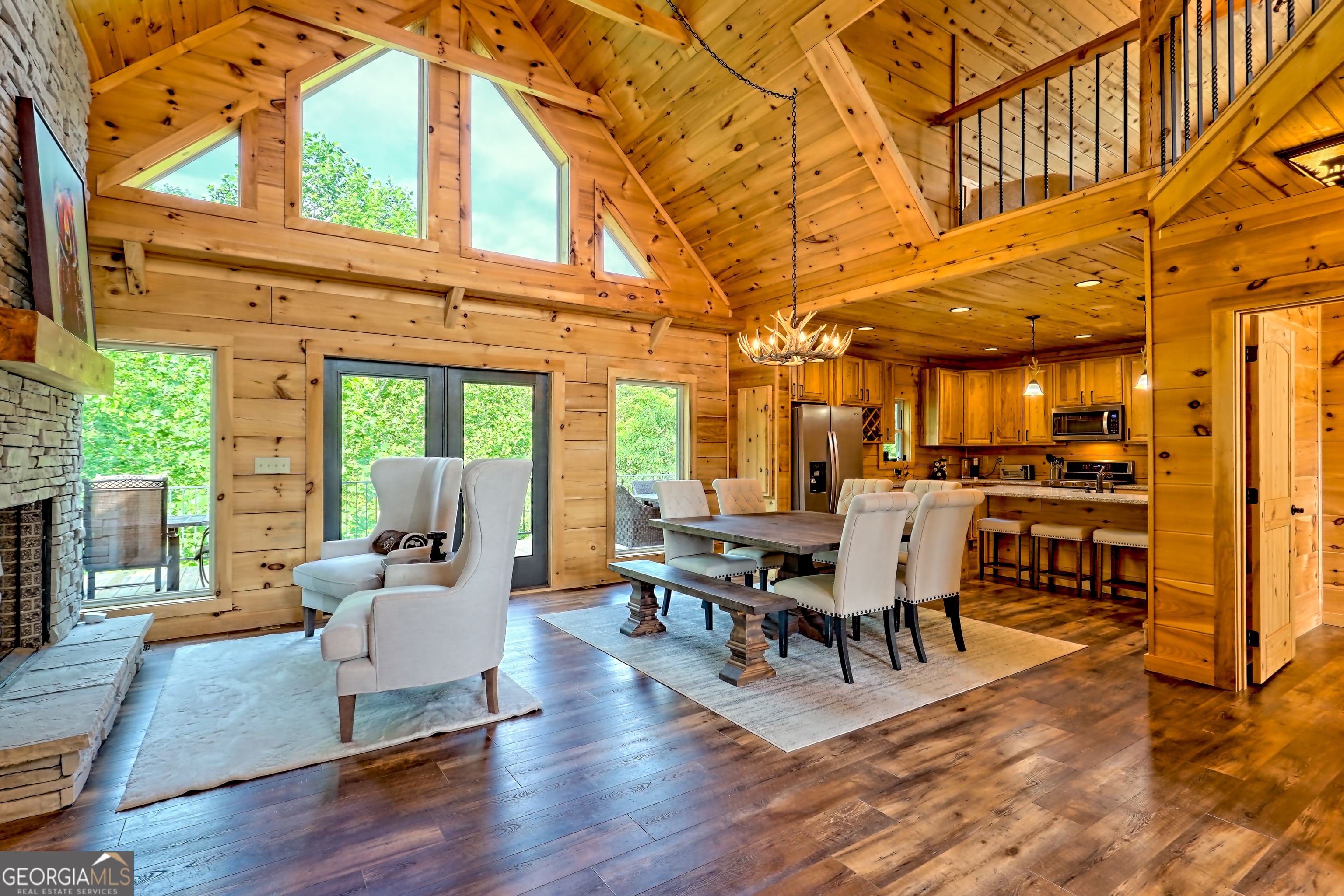 117 Ivy Rdg Way Clarkesville, GA 30523 - Photo 7 of 84 a view of a patio with table and chairs