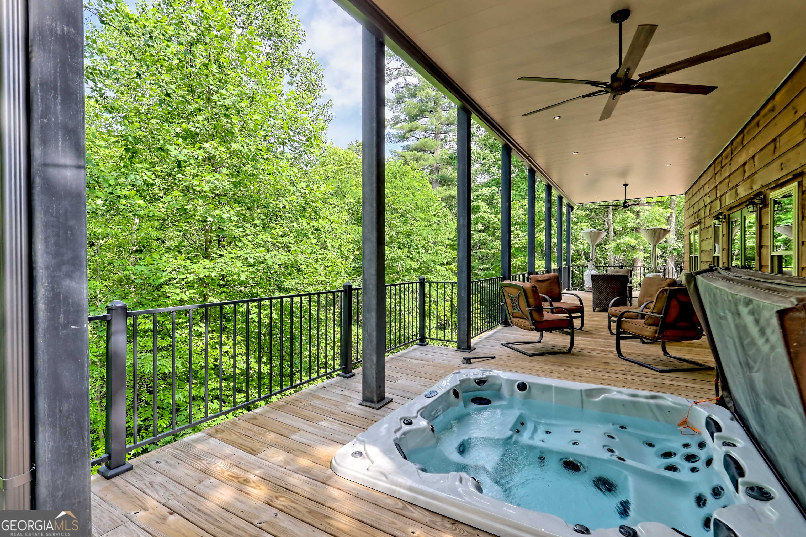 117 Ivy Rdg Way Clarkesville, GA 30523 - Photo 75 of 84 a roof deck with table and chairs and potted plants