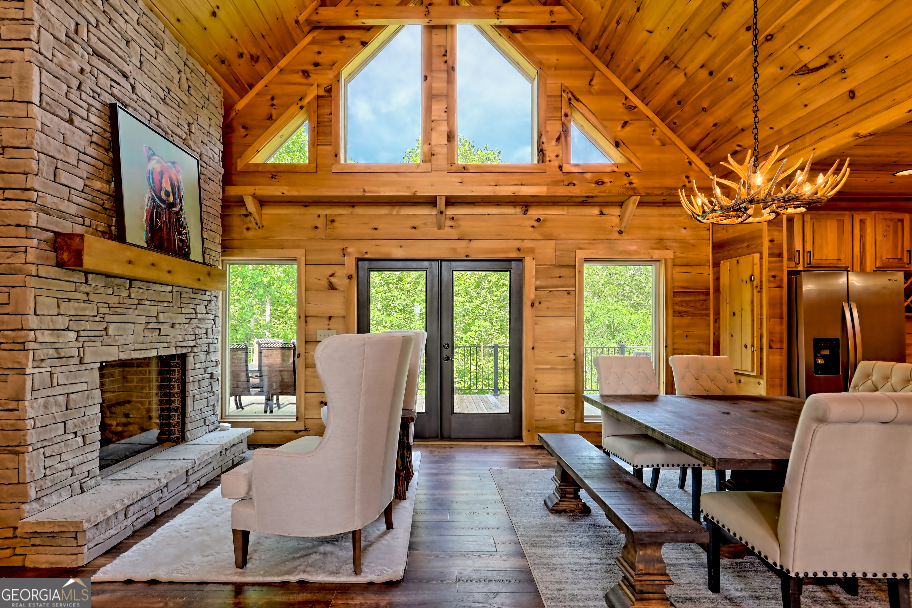 117 Ivy Rdg Way Clarkesville, GA 30523 - Photo 8 of 84 a view of a patio with a table and chairs