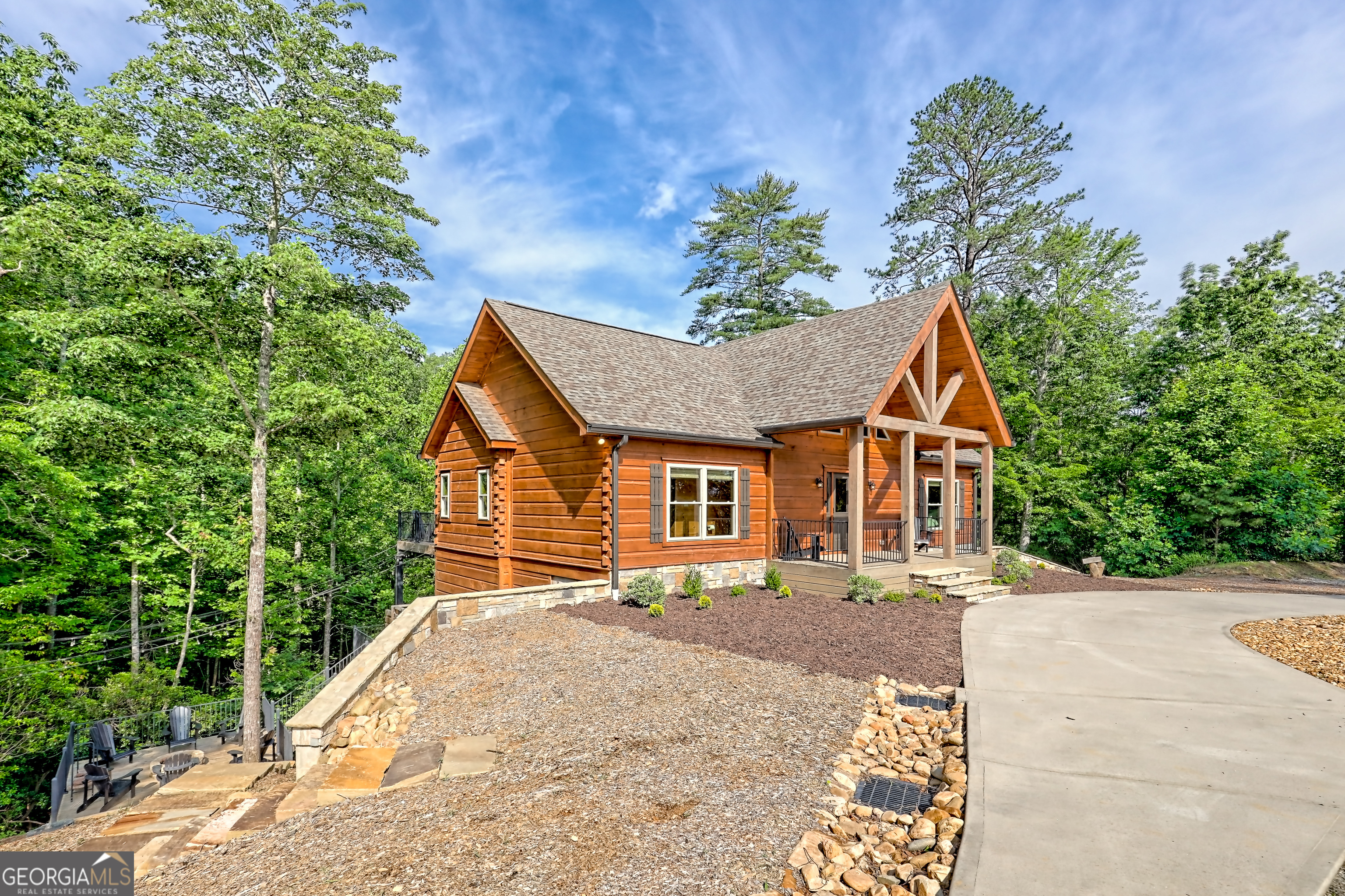 117 Ivy Rdg Way Clarkesville, GA 30523 - Photo 81 of 84 a view of a house with a small yard and a garden