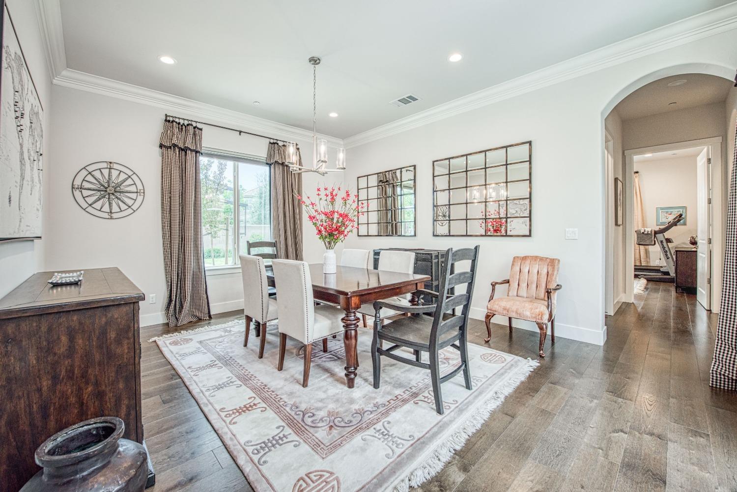 1632 North De Wolf Avenue Clovis, CA 93619 - Photo 23 of 80 a view of a dining room with furniture window and wooden floor