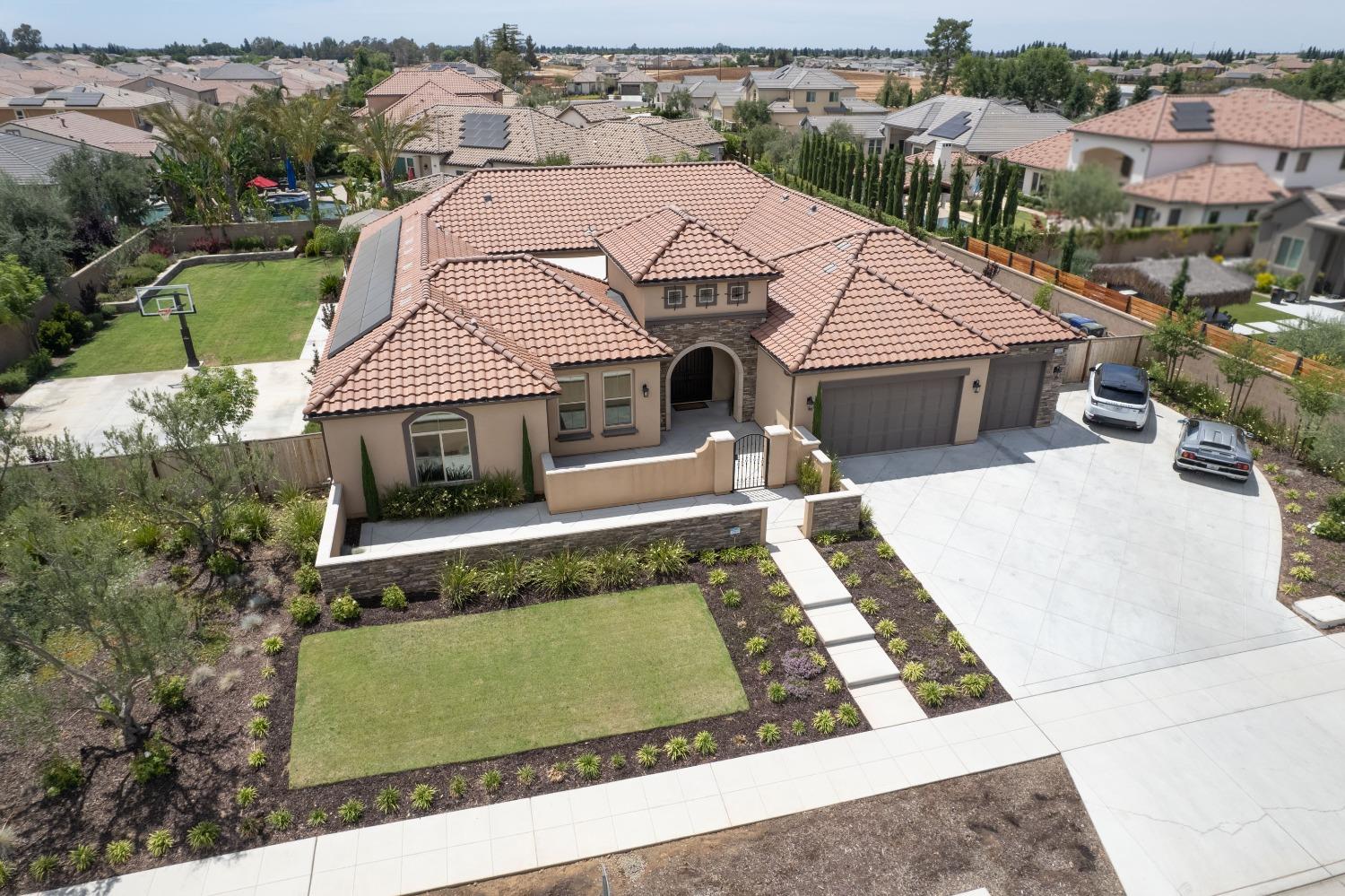1632 North De Wolf Avenue Clovis, CA 93619 - Photo 4 of 80 an aerial view of a house