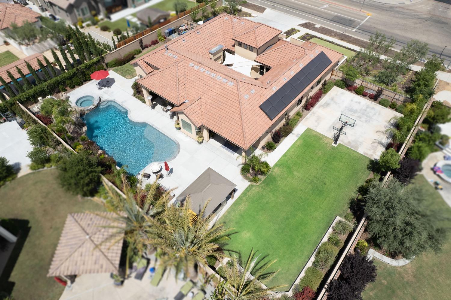 1632 North De Wolf Avenue Clovis, CA 93619 - Photo 5 of 80 an aerial view of a house