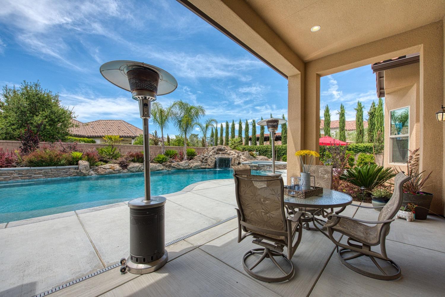 1632 North De Wolf Avenue Clovis, CA 93619 - Photo 59 of 80 a view of a porch with furniture and yard
