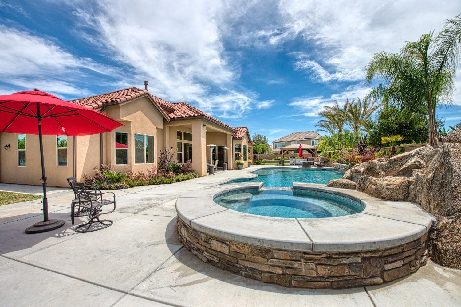 1632 North De Wolf Avenue Clovis, CA 93619 - Photo 66 of 80 a view of a house with entertaining space