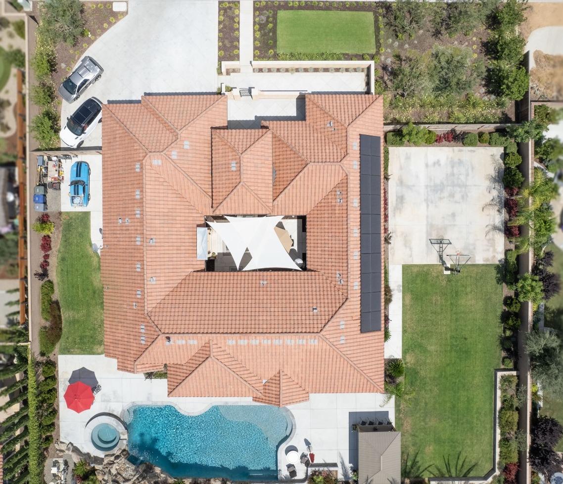 1632 North De Wolf Avenue Clovis, CA 93619 - Photo 7 of 80 an aerial view of a house with a yard