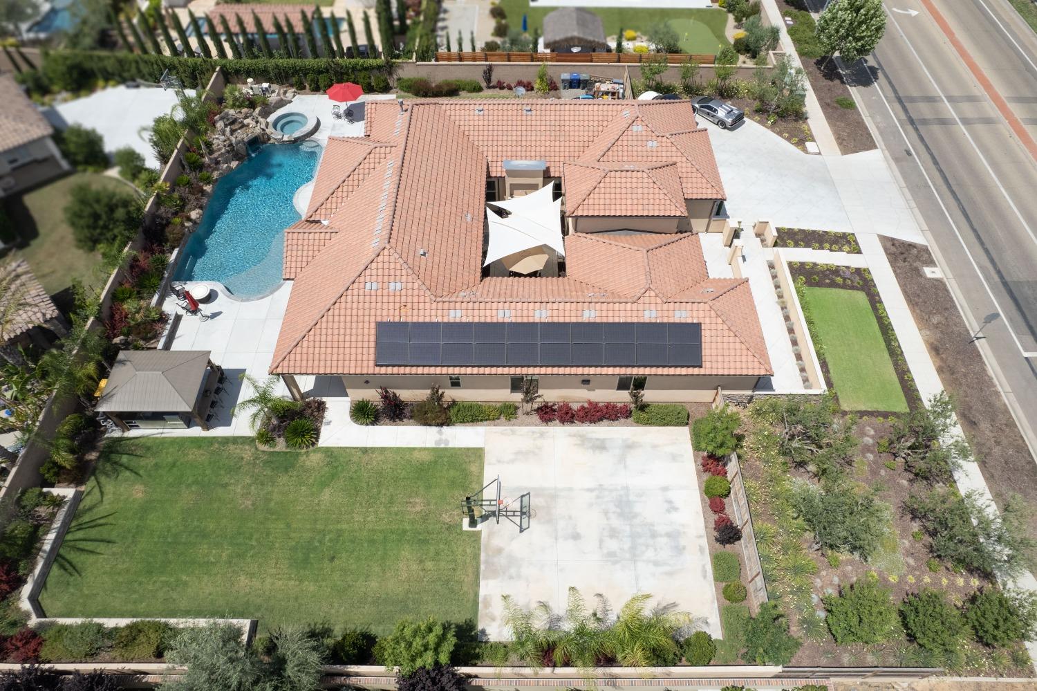 1632 North De Wolf Avenue Clovis, CA 93619 - Photo 80 of 80 an aerial view of a house with a yard