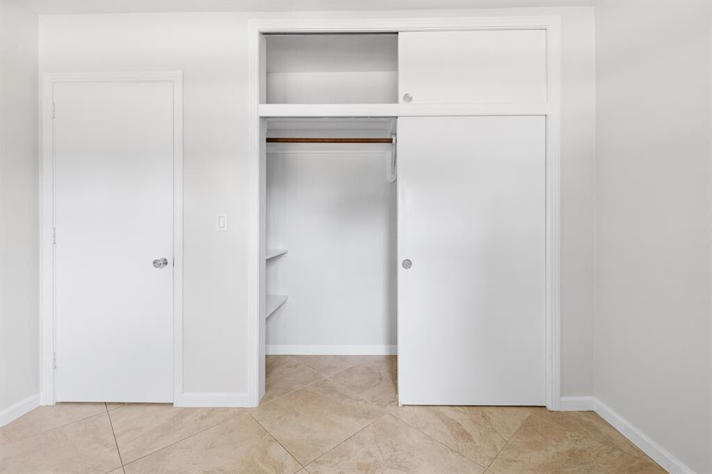 3801 Northeast 22nd Terrace, Unit 2 Lighthouse Point, FL 33064 - Photo 11 of 19 a view of an empty room