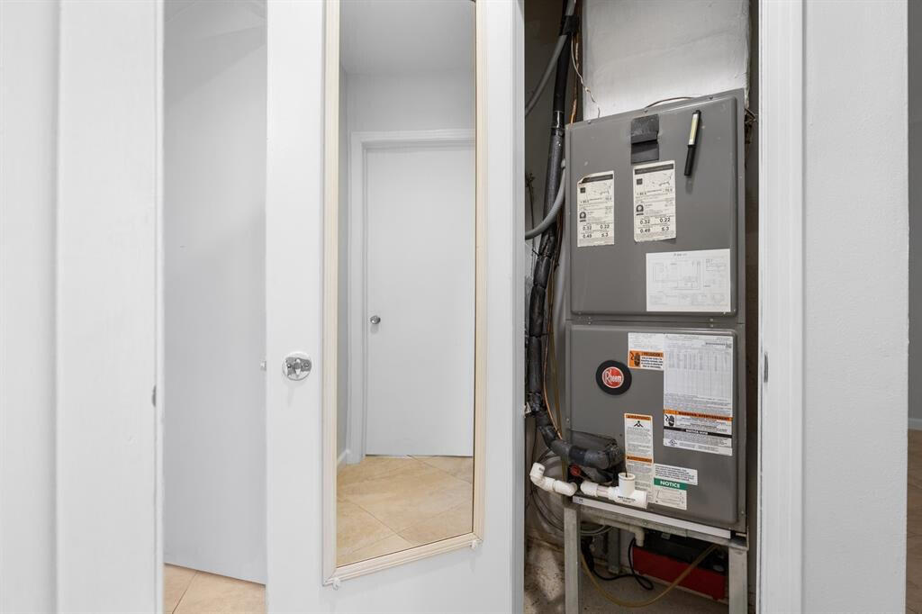 3801 Northeast 22nd Terrace, Unit 2 Lighthouse Point, FL 33064 - Photo 13 of 19 a picture of a bathroom with a glass door and shower