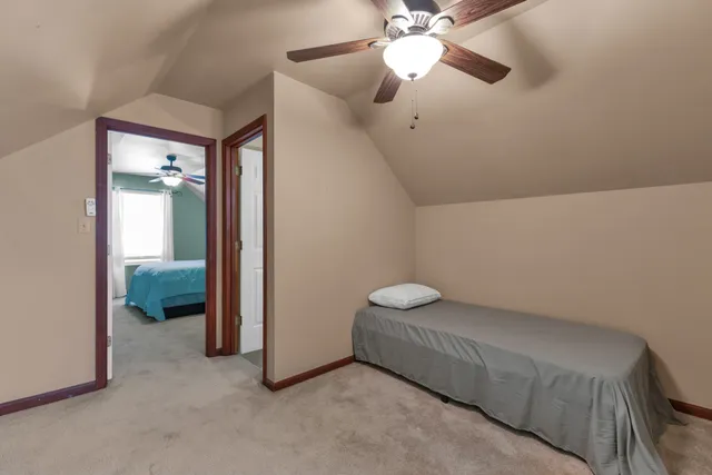 a view of a bedroom with closet