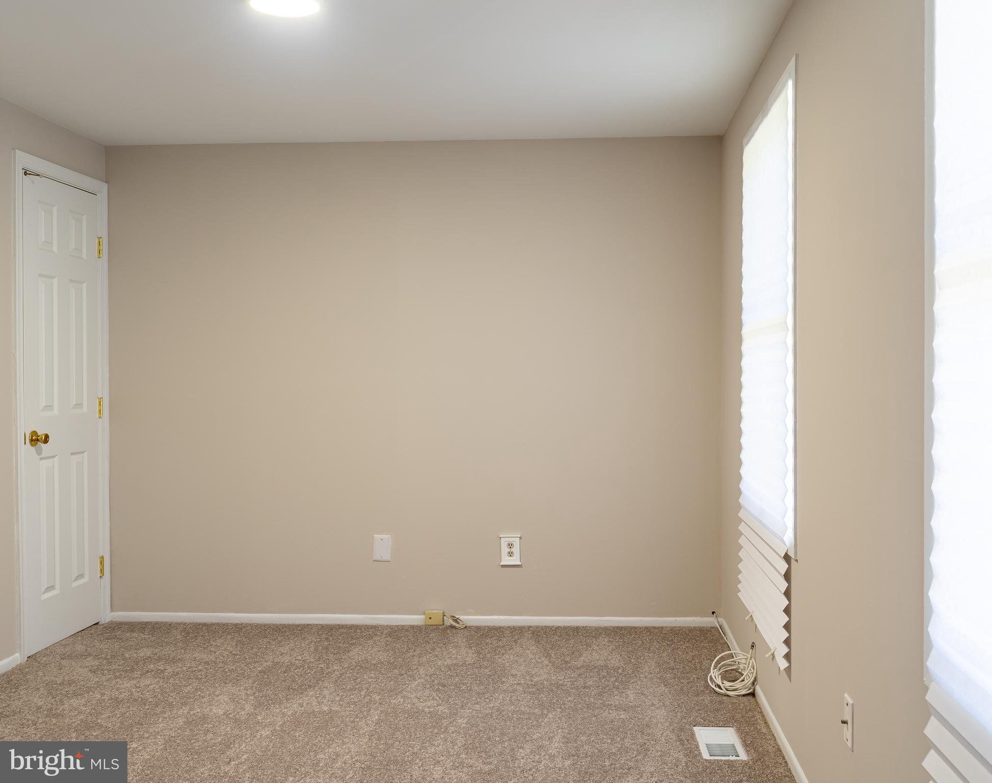 14913 Lear Lane Silver Spring, MD 20905 - Photo 21 of 34 an empty room with windows