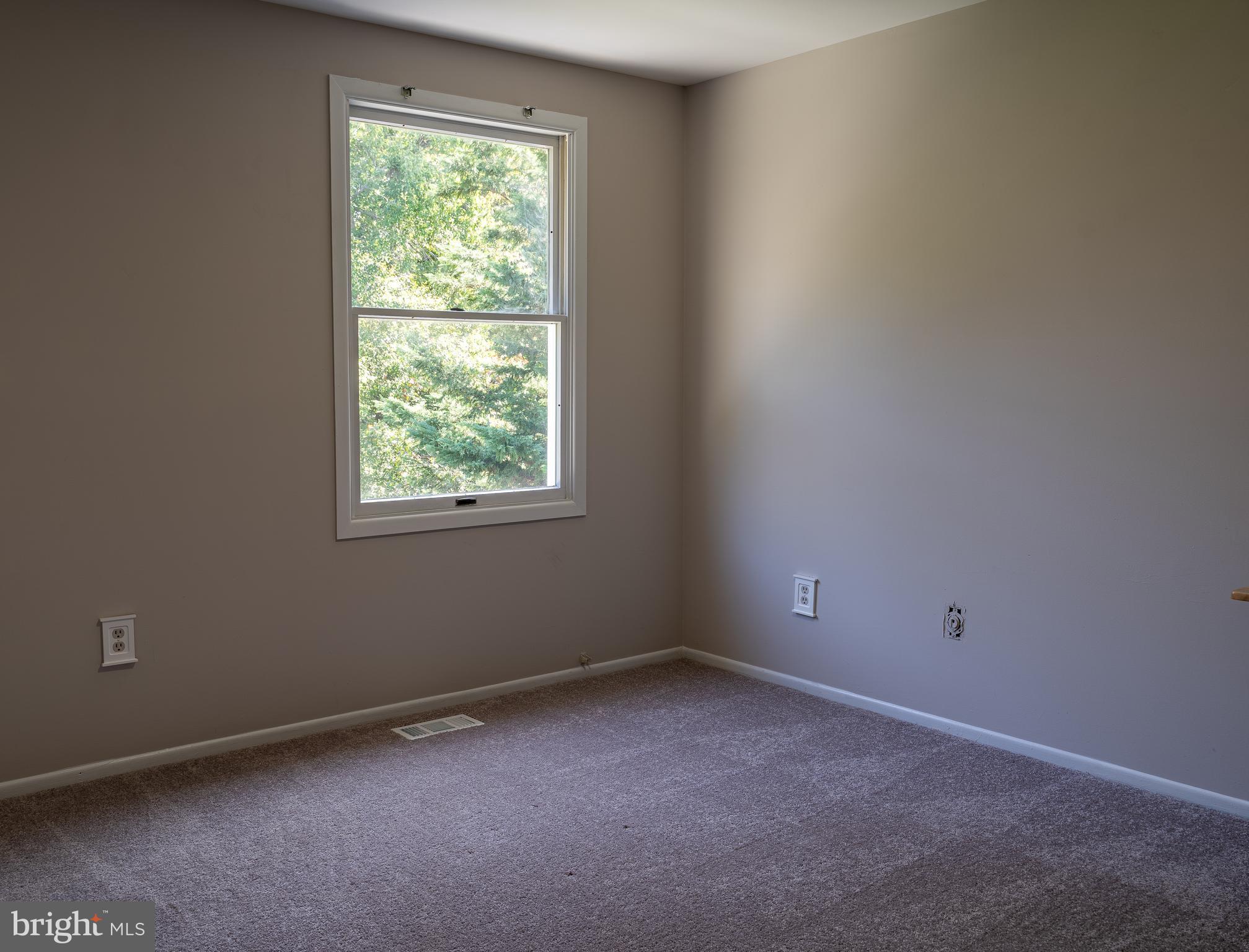 14913 Lear Lane Silver Spring, MD 20905 - Photo 25 of 34 an empty room with a window