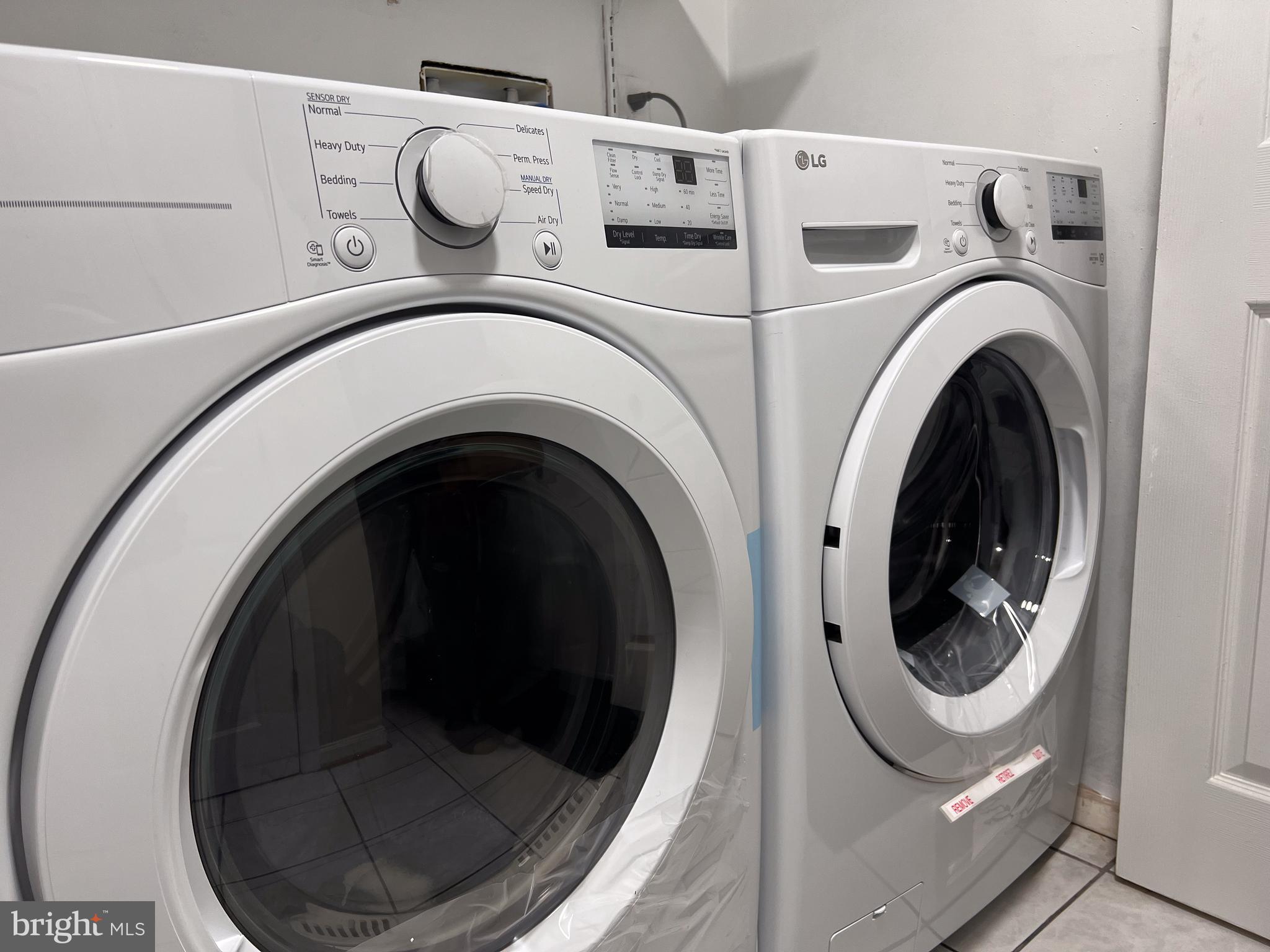 14913 Lear Lane Silver Spring, MD 20905 - Photo 8 of 34 a utility room with dryer and washer