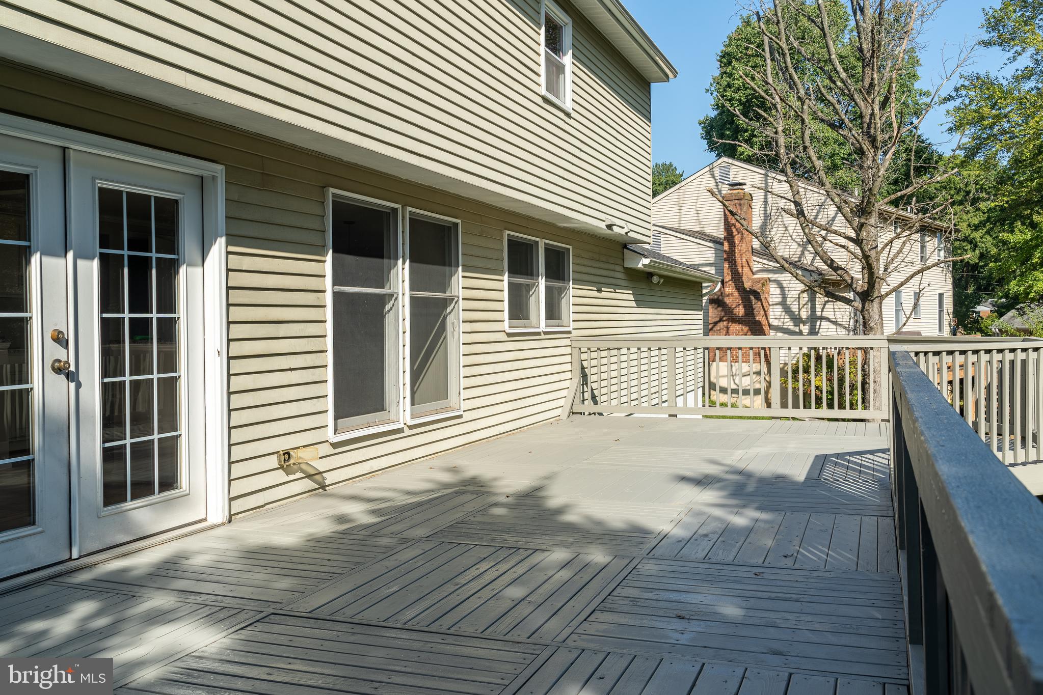 14913 Lear Lane Silver Spring, MD 20905 - Photo 10 of 34 a view of a house with a wooden deck
