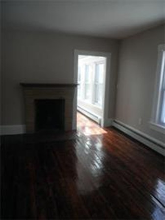 3233 Boston Road Wilbraham, MA 01095 - Photo 12 of 18 a view of an empty room with wooden floor and a window