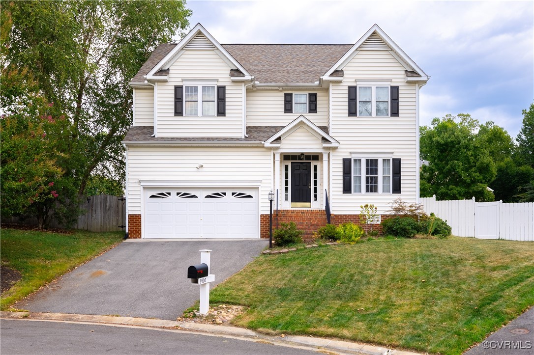 9500 Meadowview Road Henrico, VA 23294 - Photo 1 of 49 a front view of a house with a yard and garage